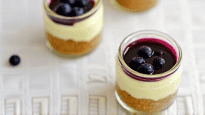 Mini Lemon Blueberry Cheesecakes Individual Jars with a Buttery Graham Cracker Crust